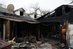 Extensive home exterior fire damage.