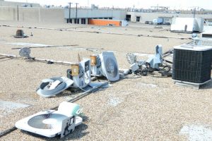 Rooftop equipment damaged by vandalism.