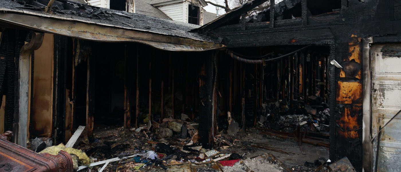 Extensive home exterior fire damage.