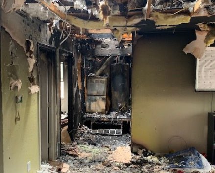 Fire damage in a home interior.